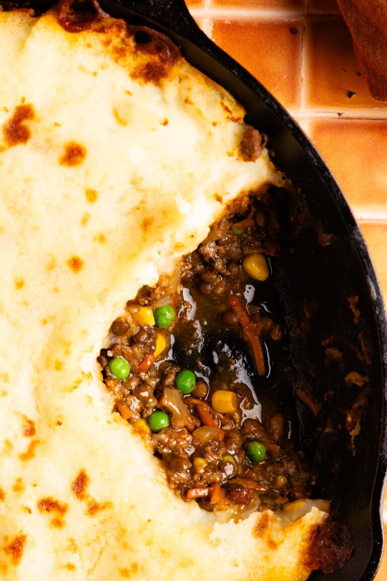 close up of healthy beef and lentil cottage pie with a scoop taken out