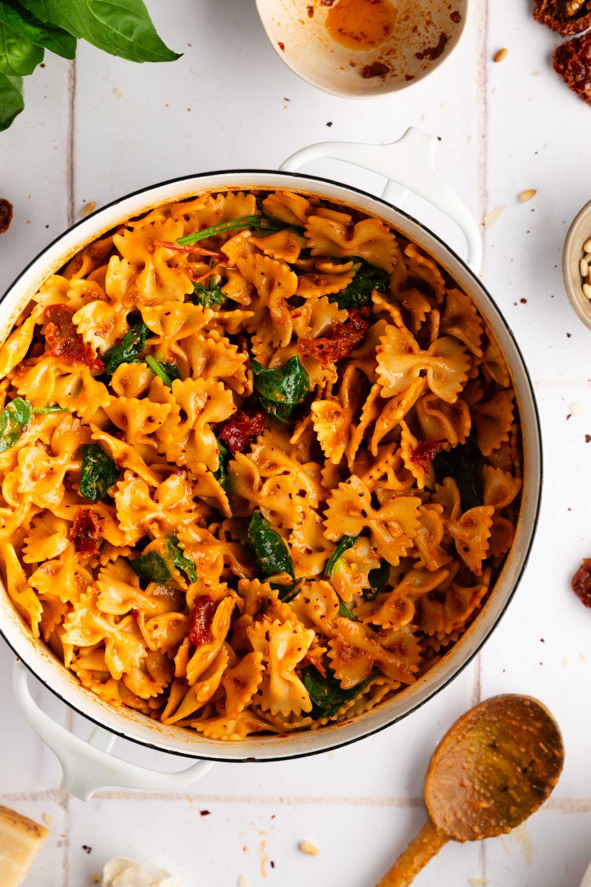 white bowl of one pot tomato pesto pasta